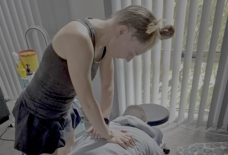 Dr Jackie - Chiropractor delivering chiropractic treatment