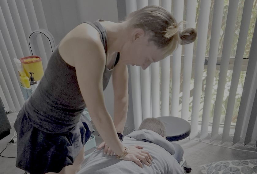 Dr Jackie - Chiropractor delivering chiropractic treatment
